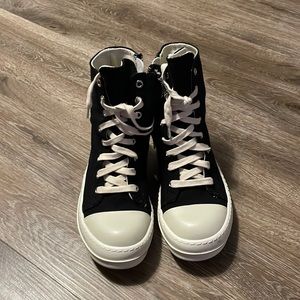 Black and white high top sneakers